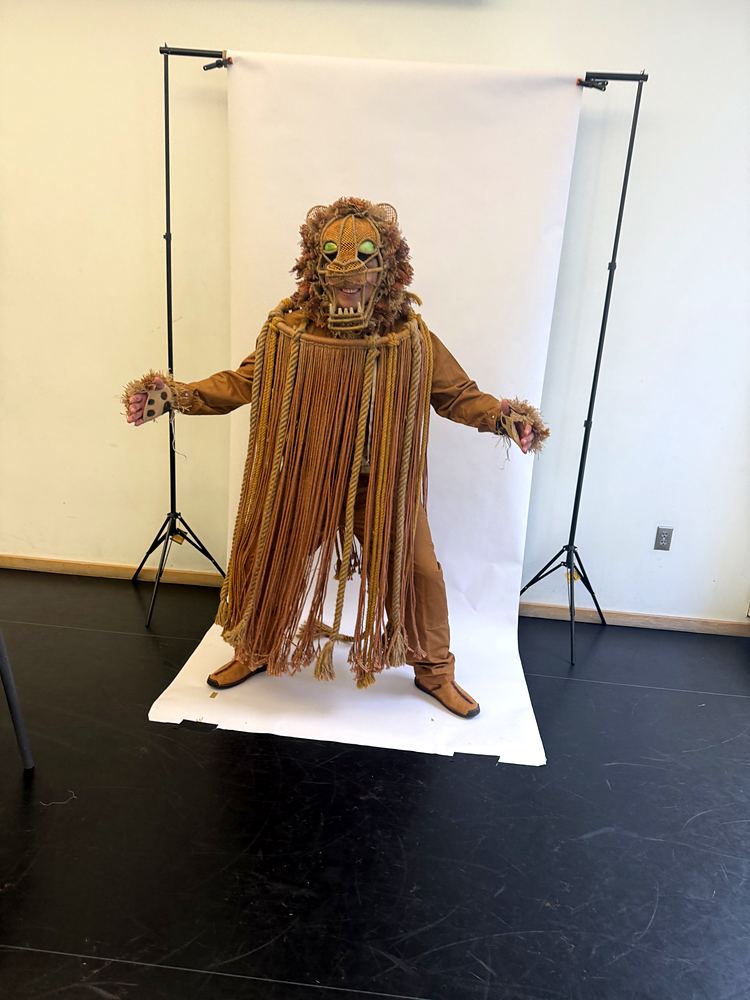 Daniel in the Lions’ Den: the Rope Lion costume at a fitting. Costume design by Cynthia Nordstrom