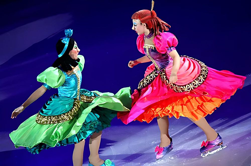 Cinderella stepsisters in ruffled green and hot pink ball gowns on ice, Rockin' Ever After. Costume design by Cynthia Nordstrom