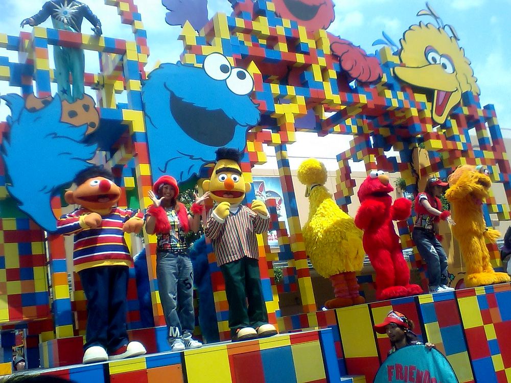 Happy Harmony Celebration: the Sesame Street float with dancers in the parade. Costume design by Cynthia Nordstrom