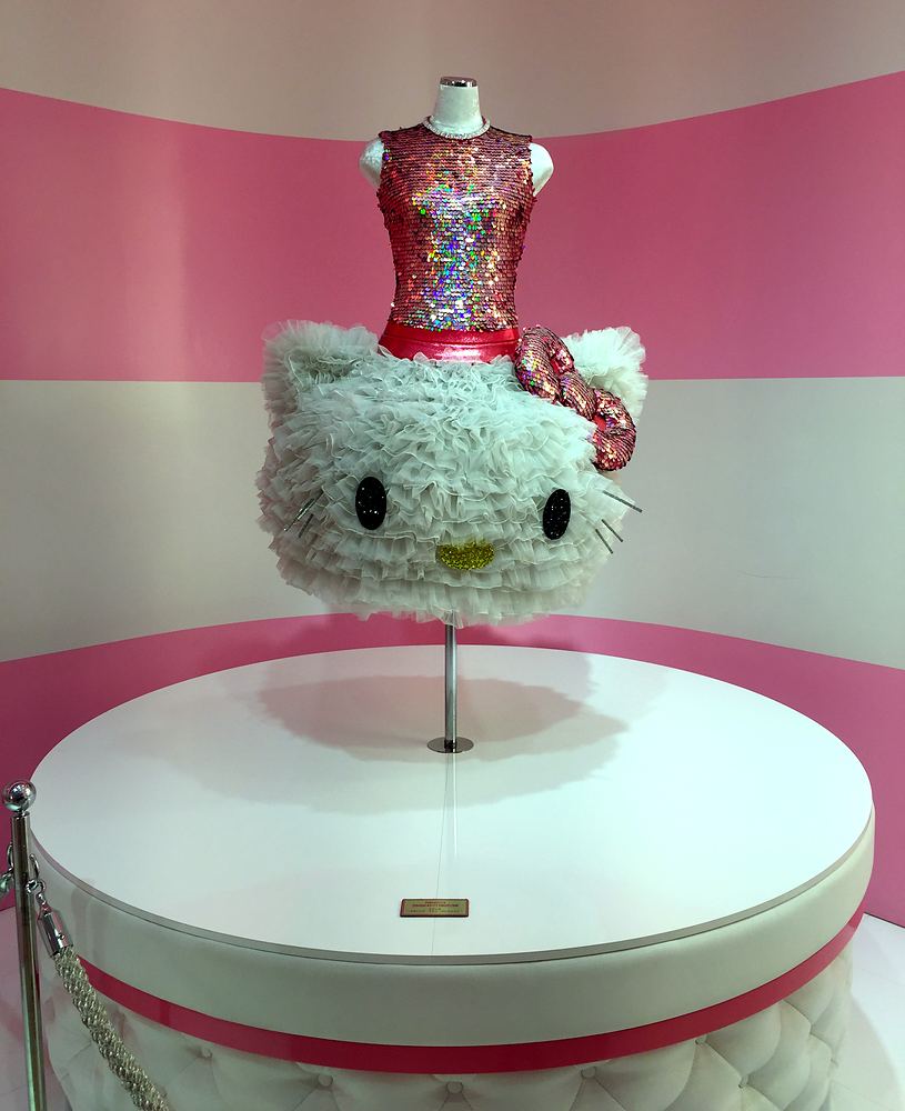 Pink sequin top over a fluffy white Hello Kitty face skirt on display, Hello Kitty's Wonderland, USJ. Costume design by Cynthia Nordstrom