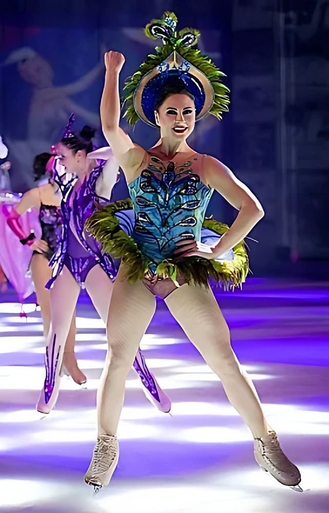 Holiday On Ice Passion: tropical feather headdress costume. Costume design by Cynthia Nordstrom