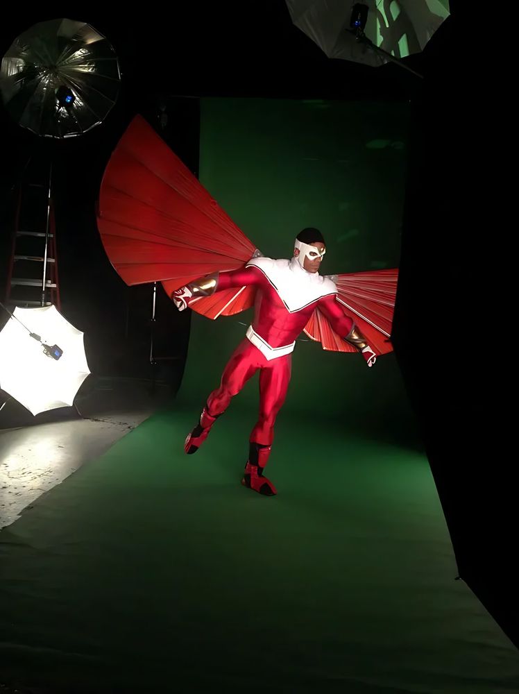 Marvel Universe Live: Falcon with red wings, filmed against a green screen. Costume design by Cynthia Nordstrom