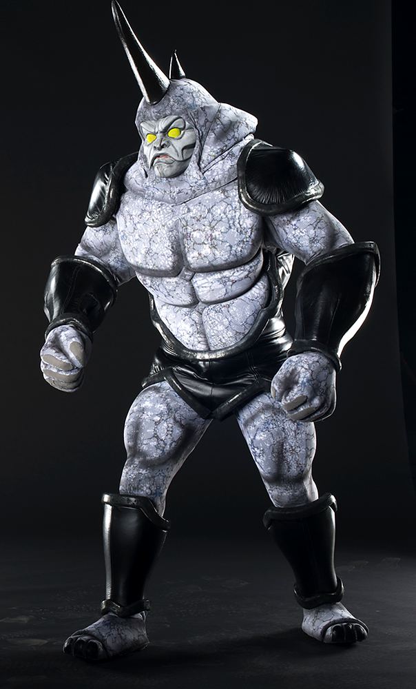 Rhino in a full gray armored body suit with horn, studio shot, Marvel Universe Live. Costume design by Cynthia Nordstrom