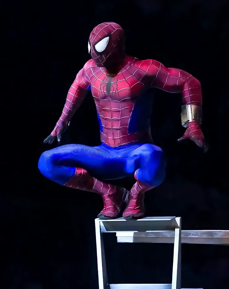 Marvel Universe Live: Spider-Man crouched on a rail. Costume design by Cynthia Nordstrom