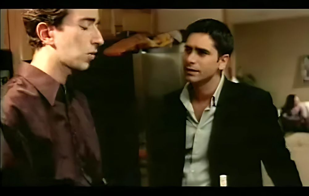 My Best Friend's Wife: trailer frame, two men. Costume design by Cynthia Nordstrom