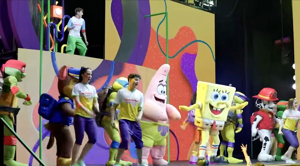 Nickelodeon Live: Está en Ti: SpongeBob, Patrick, Chase, Marshall and the Ninja Turtles dance with performers in Nickelodeon tees and purple shorts. Costume design by Cynthia Nordstrom