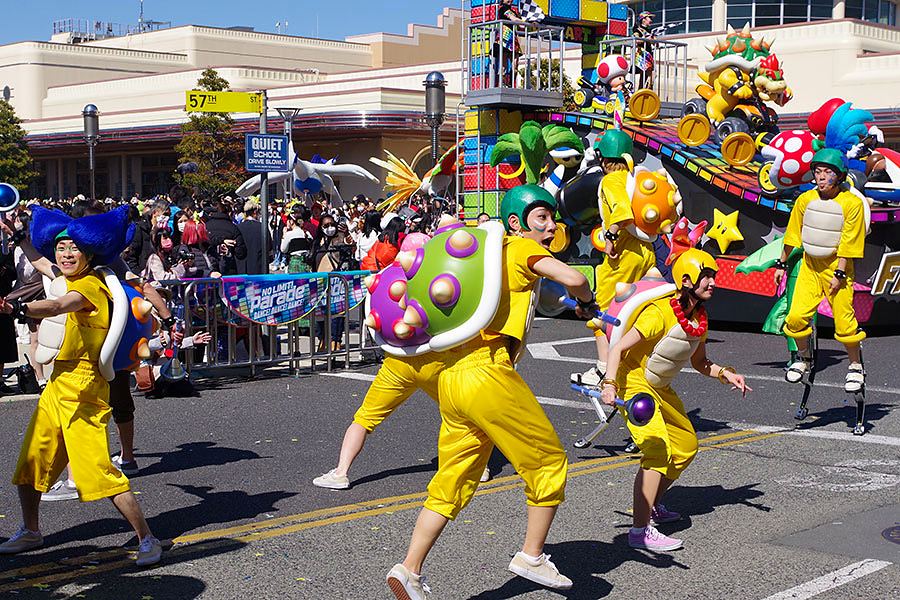 Koopa shell dancers beside the Mario Kart float, NO LIMIT! Parade. Costume design by Cynthia Nordstrom