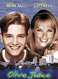 Olive Juice poster with portraits of James Berlau and Leighanne Littrell over a skyline