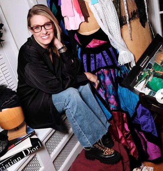 Cynthia Nordstrom at work in the costume shop with wig heads