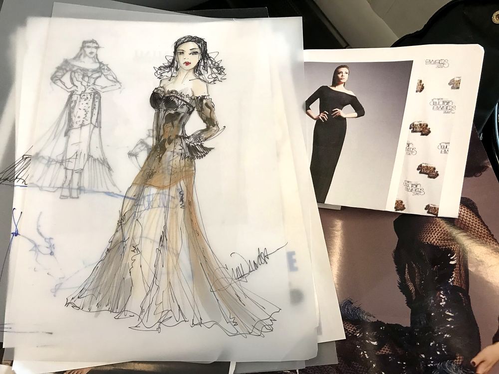 Pencil sketches of a gown on tracing paper with a fabric swatch board, Rocktopia. Costume sketch by Cynthia Nordstrom