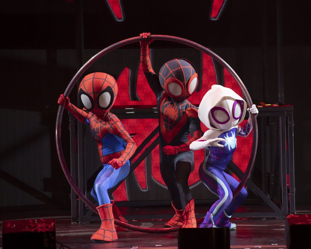 Spidey and His Amazing Friends live show: Spidey, Spin and Ghost-Spider strike a pose in a hoop. Costume design by Cynthia Nordstrom