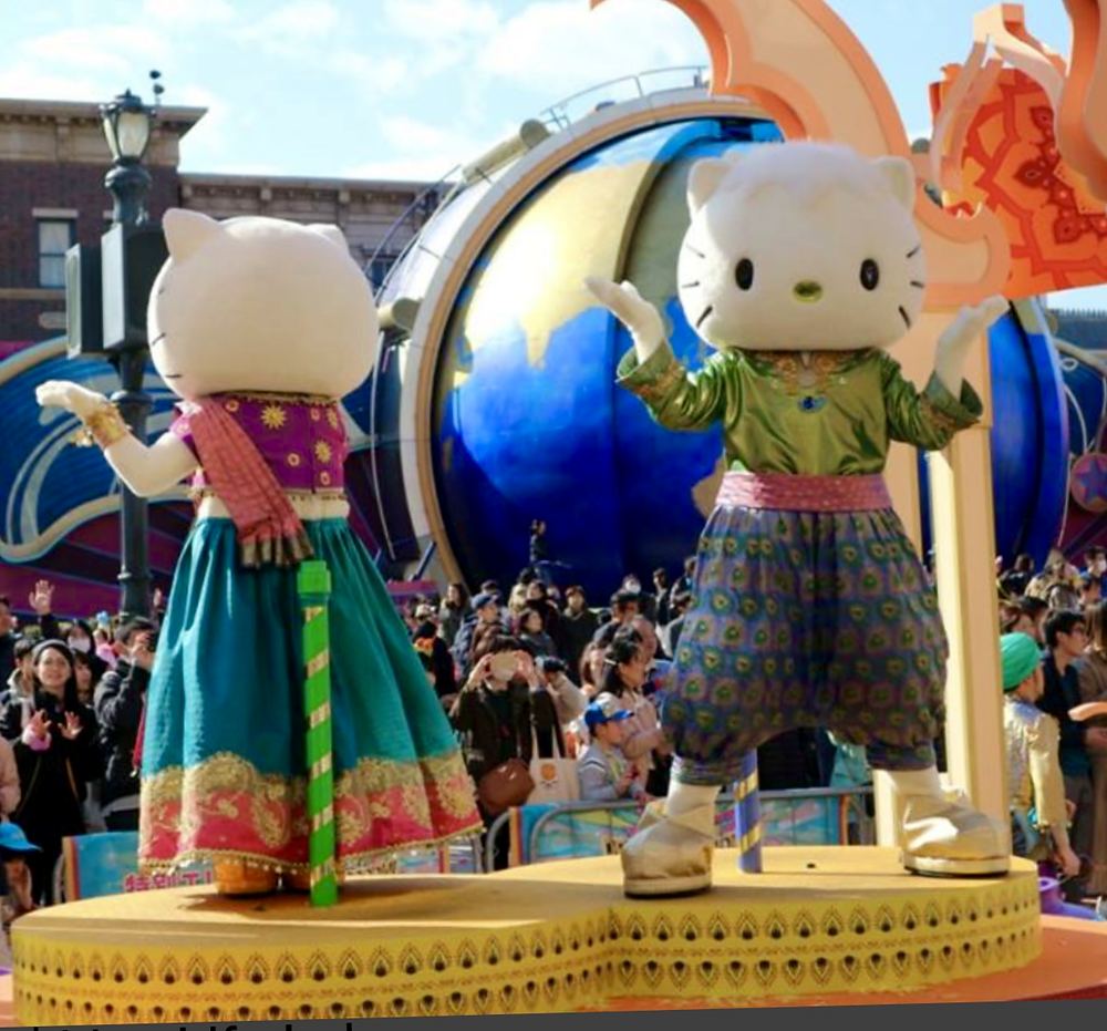 Hello Kitty characters in Indian-inspired sari and tunic looks on a float, USJ anniversary shows. Costume design by Cynthia Nordstrom